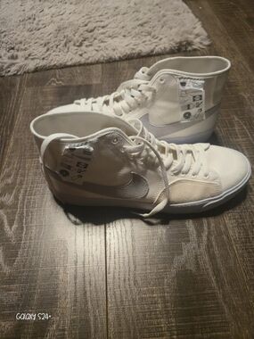 Nike Mens White High-Top Canvas Sneakers with Light Gray Swoosh